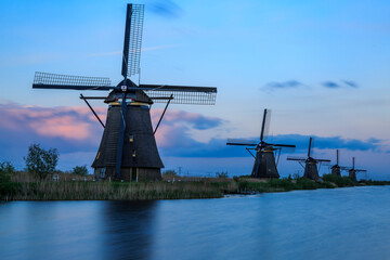 Europe, The Netherlands, South Holland, Alblasserwaard polder, Molenlanden, Kinderdijk. Largest concentration of old windmills in the Netherlands protected UNESCO World Heritage Site.