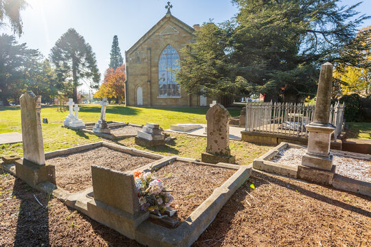 Graves in a cemetery at the back of church