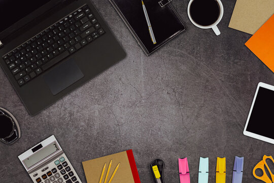 Top view desk office workspace and laptop and supply equipment with empty copy space for freelance working productive workplace area or home office flat lay background. - Powered by Adobe
