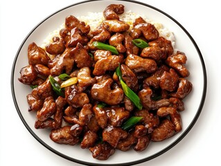 A delicious plate of stir-fried dark brown beef or pork with green onions served over fluffy white rice in a vibrant and appealing presentation