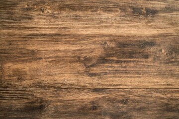 Naklejka premium Rustic brown wooden background texture for tabletop, surface, or wall paneling design