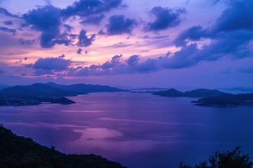 Obraz premium Serene island sunset vista from mountaintop