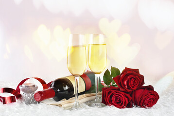 Valentines day background with champagne glasses and red roses	