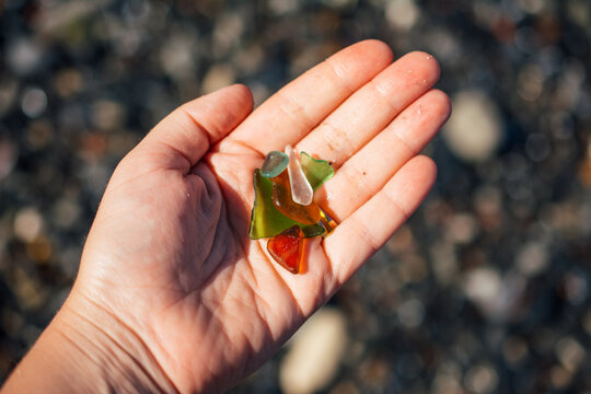 Broken glasses on a hand
