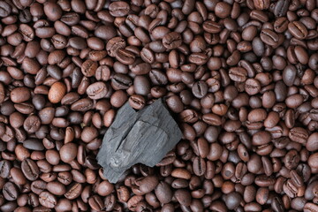 Coffee beans and charcoal, natural production concept