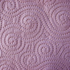 Embossed pastel pink texture with elegant swirl patterns and dotted relief. Ideal for luxury backgrounds, paper textures, packaging, stationery, wallpapers, and refined feminine design projects.