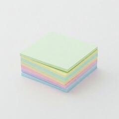pastel colored stack of sticky note pads on white background