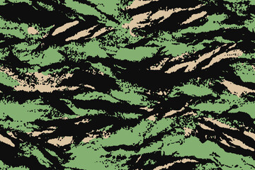 Camouflage seamless pattern.  Tiger stripe camouflage pattern. Forest real tree camouflage design. Hunting camouflage. Tiger stripe pattern.