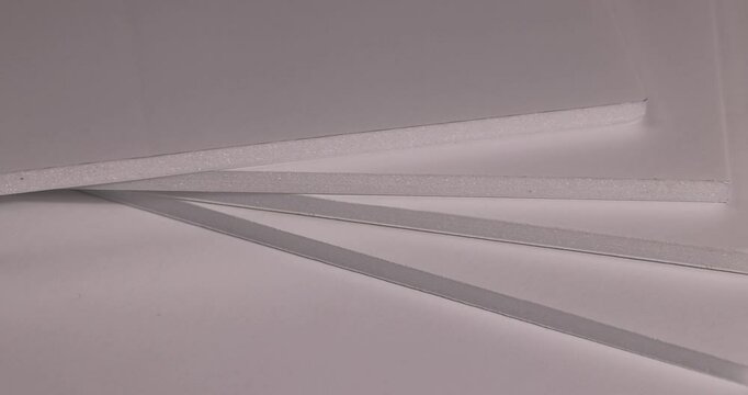 white foam board for creative work and creation of various models and objects, closeup