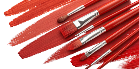 Various red paint strokes with brushes for artistic creativity in a studio setup