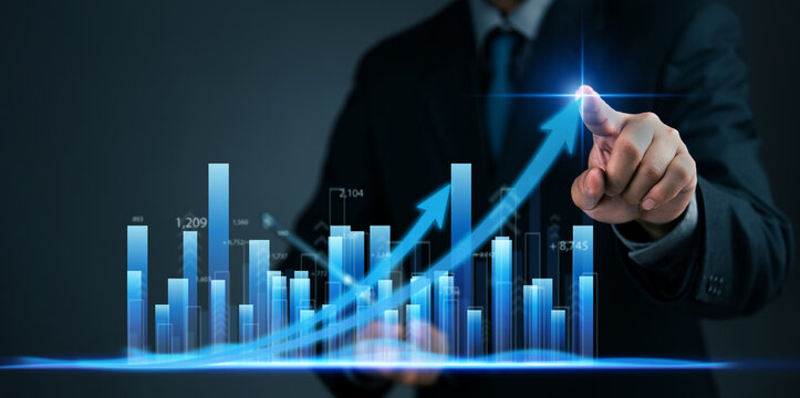 businessman pointing at a digital graph and arrows with an upward trend, business growth, data analysis, and financial investments performance. statistics, market trends development - Powered by Adobe