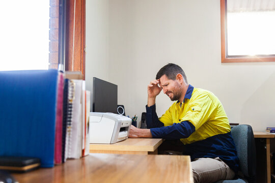 Man in home office feeling unsure