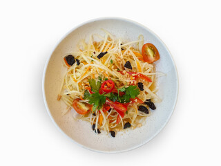 A Plate of spicy papaya salad or somtum isolated in white background. Top View.