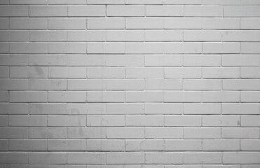 A white brick wall as a background with and  a softly shaded, old.