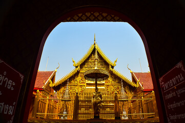 Fototapeta premium Pagoda and Chapel, Lanna Architecture, Symbols of Buddhism, South East Asia at Wat Khong Khao, Hang dong District Chiang Mai, Northern Thailand