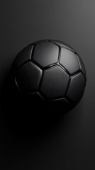 Dark soccer ball on black background