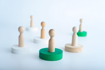 Obraz premium wooden figures on white, business group and team, working together, empty copy space, minimalism and abstractive