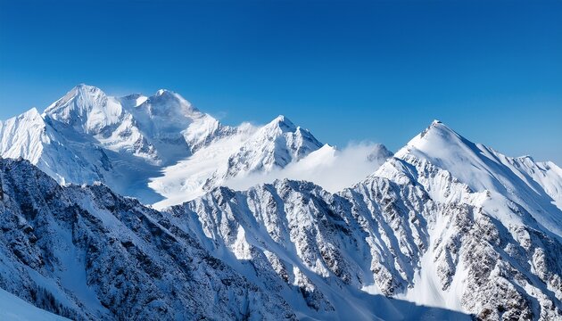 a snowy mountain range with a clear blue sky - Powered by Adobe