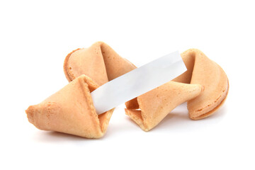 Fortune cookies broken with piece of paper isolated on white
