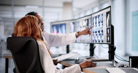 Medical Professionals Analyzing MRI Scan