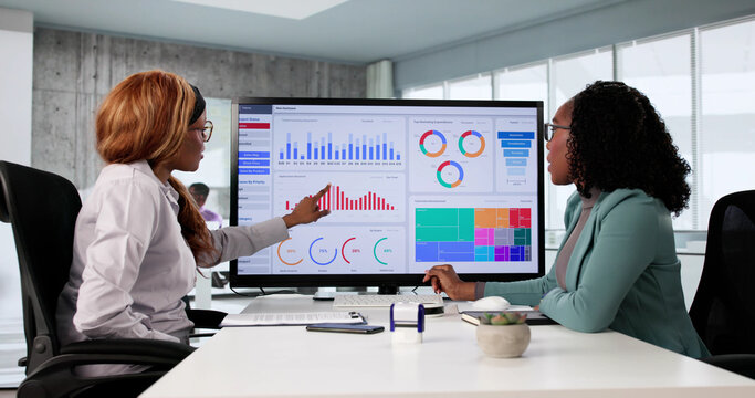 Multicultural Analyst Woman Leading Financial Analysis Meeting