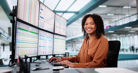Data Analyst African Woman Using Spreadsheet