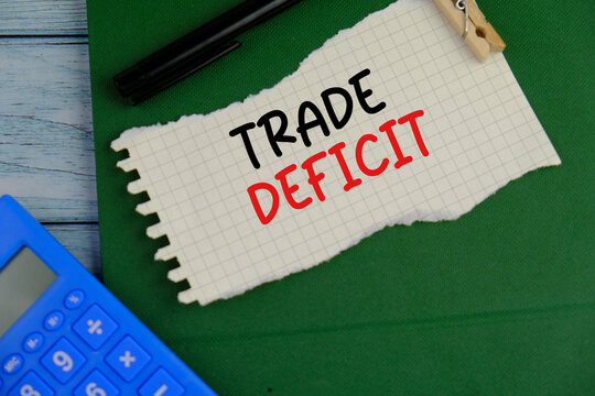 Trade deficit on white paper background