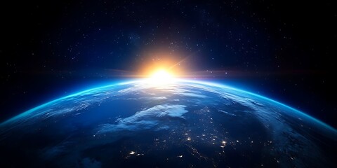 Obraz premium Planet Earth in space with the sun shining on it, showing oceans, clouds, and a glowing atmosphere in the cosmos