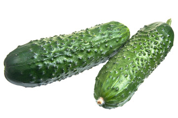 Two fresh, green cucumbers. Perfect for food blogging, healthy eating promotions, or illustrating garden-fresh produce. Isolated on white
