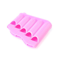 Toy harmonica isolated on white. Child's musical instrument