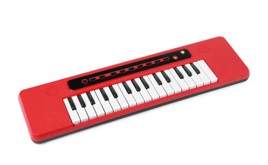 Fototapeta premium Red toy electric piano isolated on white