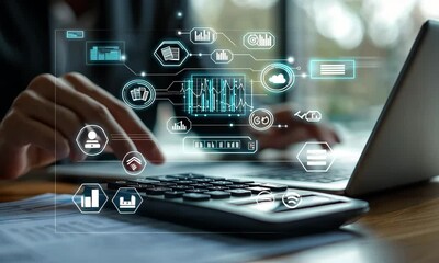 Hands Operating Calculator and Laptop with Virtual Data Visualization in Warm Light on Wooden Table