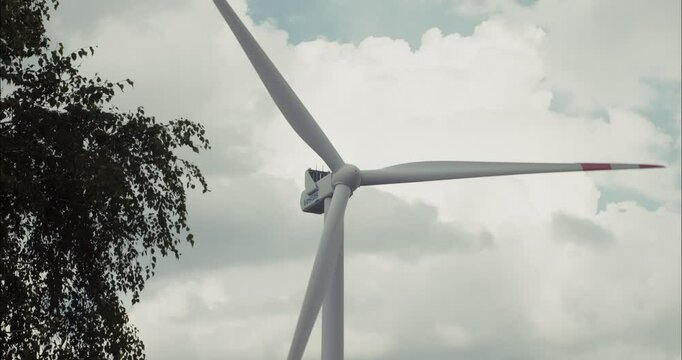 Wind turbine rotating blades generating green energy
