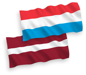 Flags of Latvia and Luxembourg on a white background