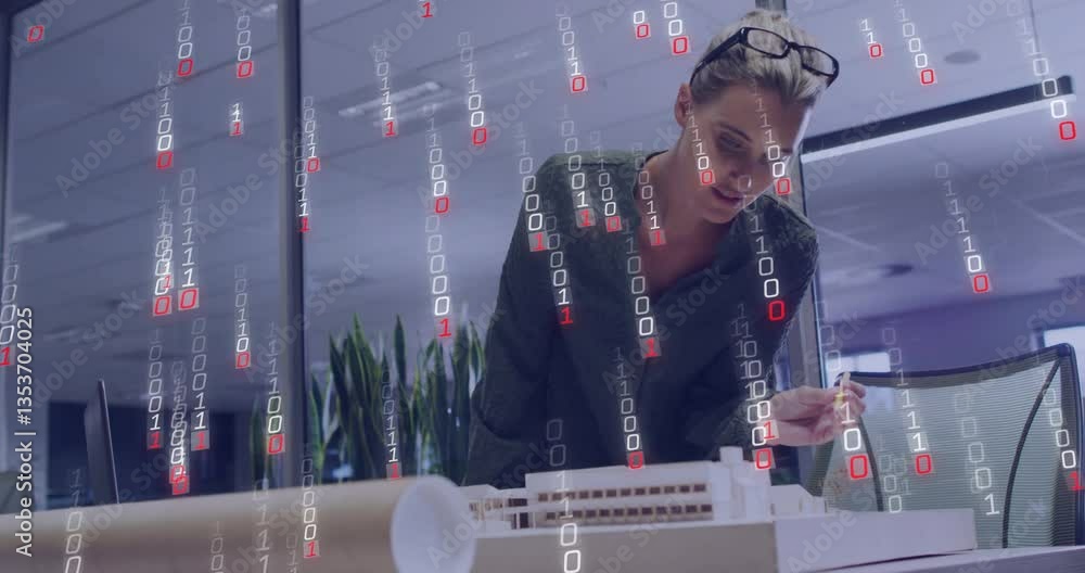 Poster examining architectural model, woman with binary code animation overlay in office