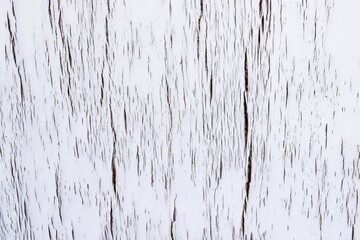 Old and cracked white plywood board background