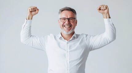 Naklejka premium Happy Middle Aged Businessman Celebrating Success in Professional Attire