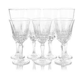 Many empty clean glasses isolated on white