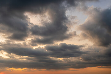 Dramatic clouds at sunset, sky background, weather