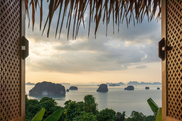 Scenic Tropical Island View Through Traditional Hut Window for Luxury Travel and Wellness Concept © 2April