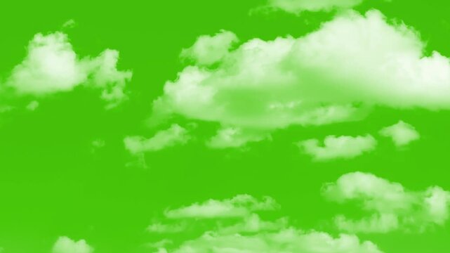 Cloud Green Screen stock video. Chroma key cloud effects. Moving clouds motion graphic effects.
Moving white clouds green screen alpha channel background, White fluffy clouds on a green screen.