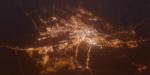 Street lights map of Al Ain (UAE) with tilt-shift effect, view from east. Imitation of macro shot with blurred background. 3d render, selective focus