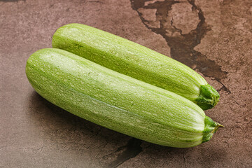 Raw green ripe zucchini vegetable