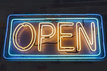 A vibrant neon sign with the word 'OPEN' illuminated in bold, glowing letters