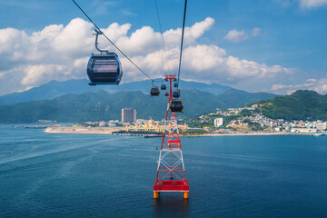 ropeway of cableway over the sea to Hon Tre Island at Vinpearl Amusement Park in Nha Trang in...