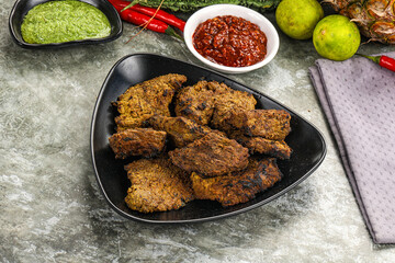 Grilled beef barbecue with spises
