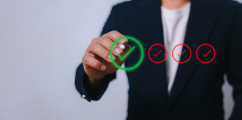 Businessman write or tick correct mark to approve document or project, Application for certificate,...