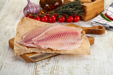 Raw Tilapia fish fillet slice