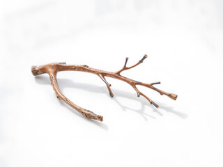 Obraz premium A single dry twig isolated on a white background, minimalistic and simple. Generative AI