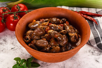 Baked chicken hearts with vegetables